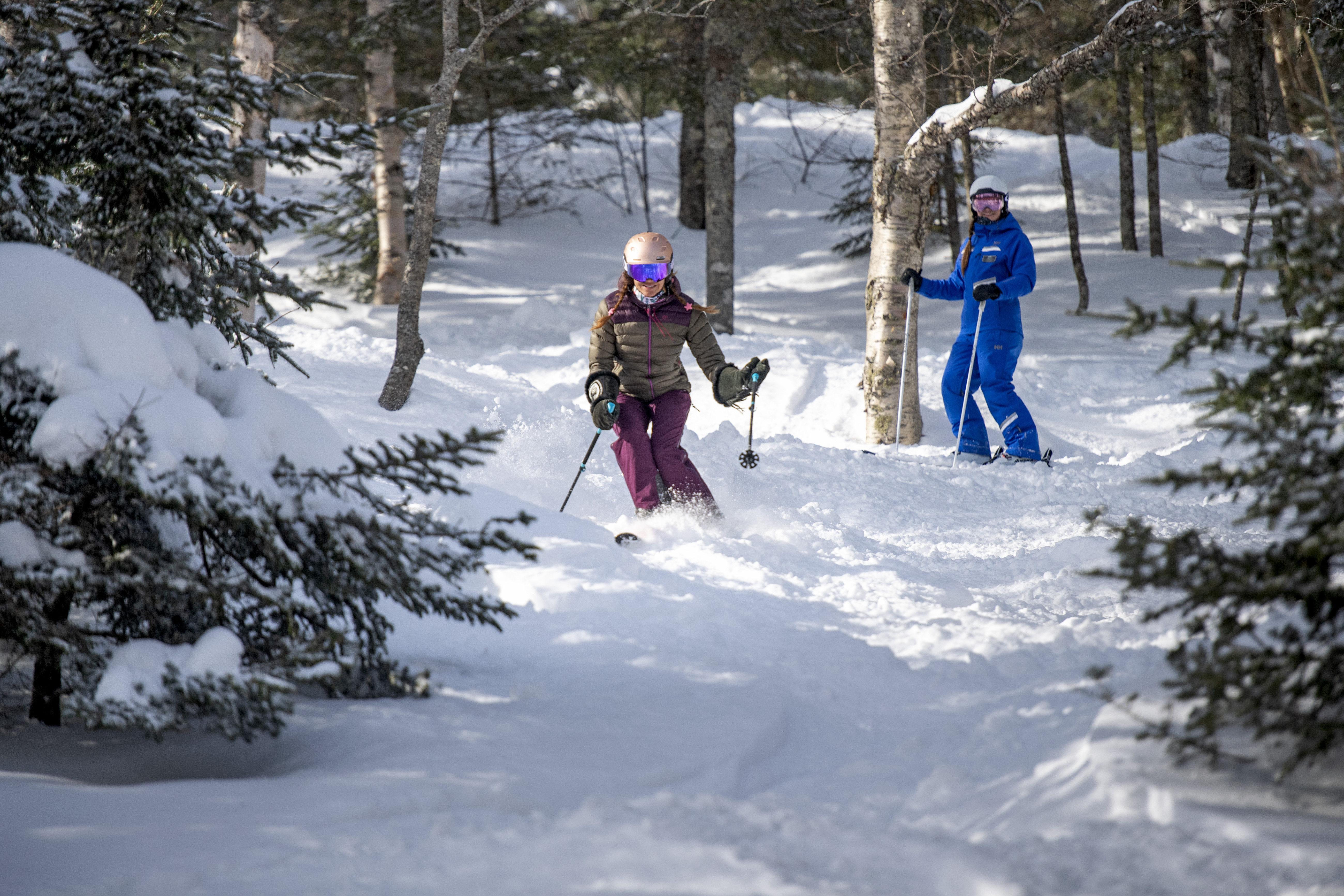 Group of friends in a ski school lesson at Stowe, VT.
